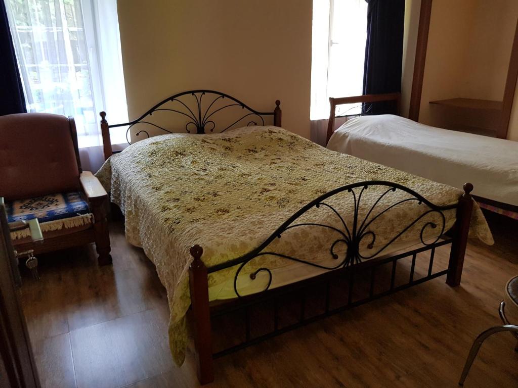 Postel nebo postele na pokoji v ubytování Tamari Guest House