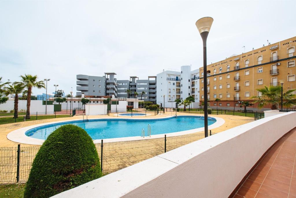 Bazén v ubytovaní Playa del Cantil, 3 bedrooms and 2 free parking alebo v jeho blízkosti