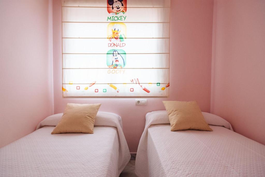 Posteľ alebo postele v izbe v ubytovaní Playa del Cantil, 3 bedrooms and 2 free parking