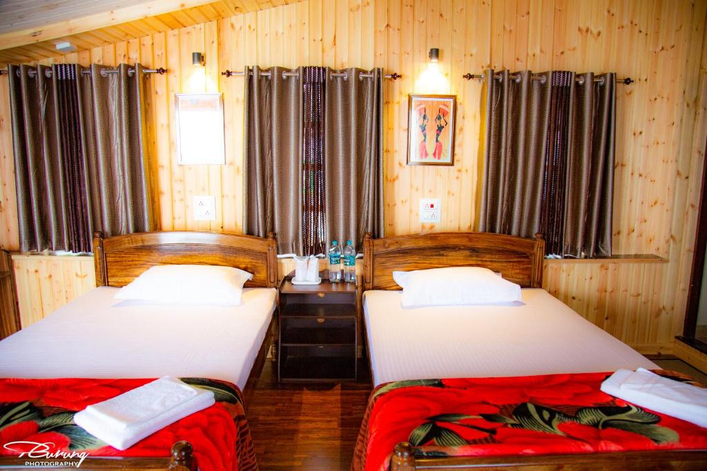 Postel nebo postele na pokoji v ubytování Dreamhome Stay