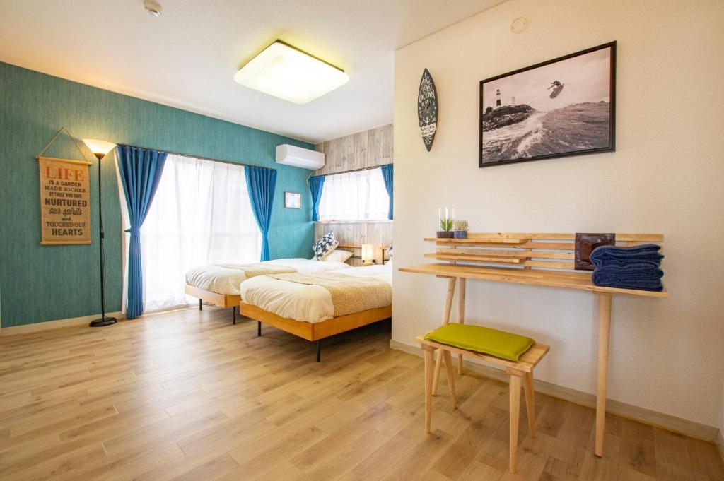 Postel nebo postele na pokoji v ubytování Villent Kujukuri Ocean 1