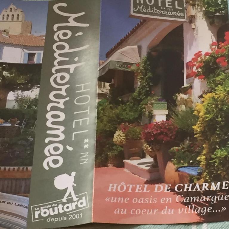 a sign for a hotel de chambrevenueitime costs on camargue at Hotel Le Méditérranée in Saintes-Maries-de-la-Mer