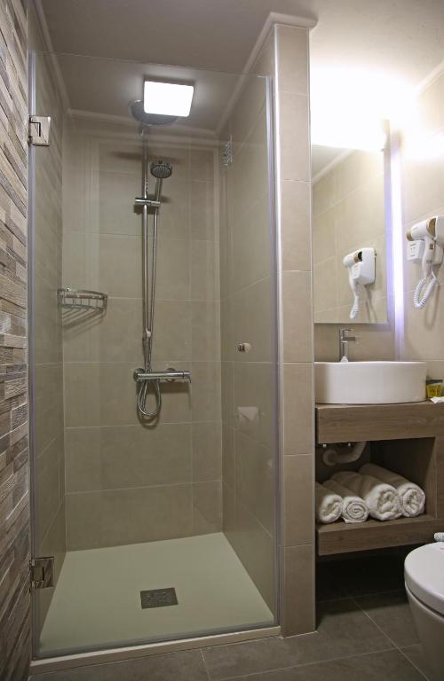 Koupelna v ubytování Elysee Hotel