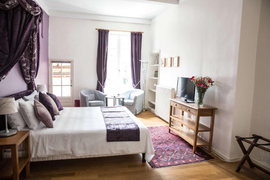 Postel nebo postele na pokoji v ubytování La Résidence Chambre d'Hotes
