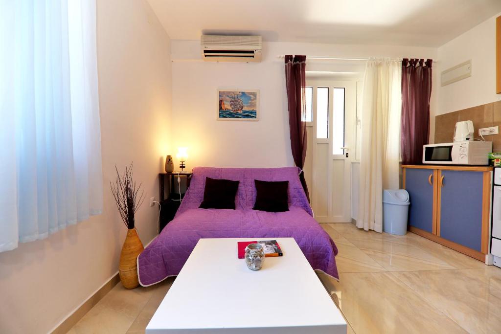 Postel nebo postele na pokoji v ubytování Apartments Anka