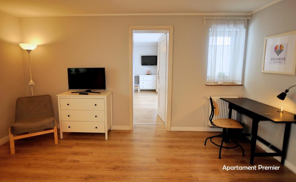 Televízia a/alebo spoločenská miestnosť v ubytovaní Biały Dom - 2 Bedrooms