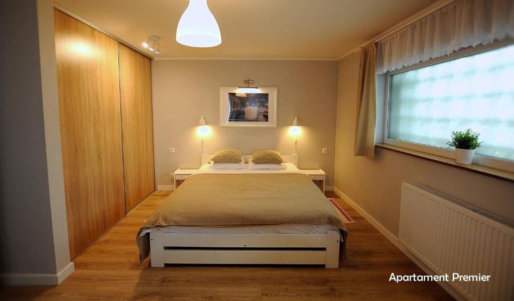 Posteľ alebo postele v izbe v ubytovaní Biały Dom - 2 Bedrooms