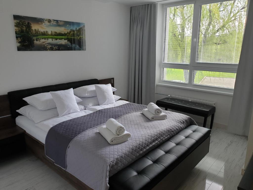 Postel nebo postele na pokoji v ubytování Apartmány Urban