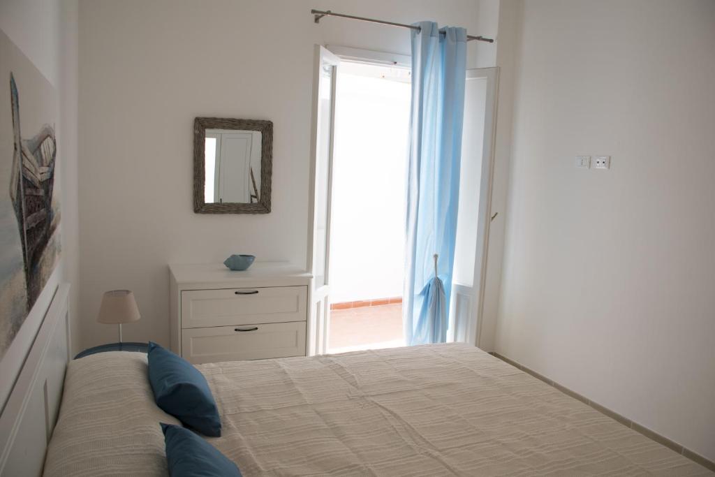 Posteľ alebo postele v izbe v ubytovaní Casa Vacanze Mondello Mare Piscina ALBAMAOR