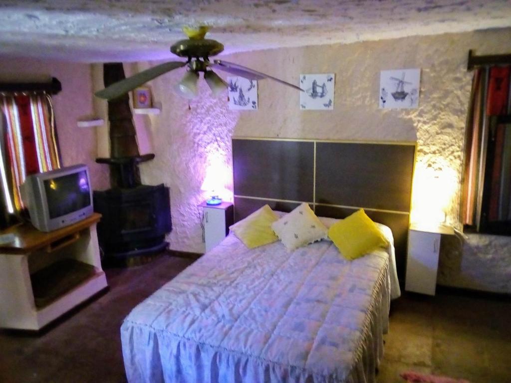 Postel nebo postele na pokoji v ubytování CORTIJO-LA LOMA