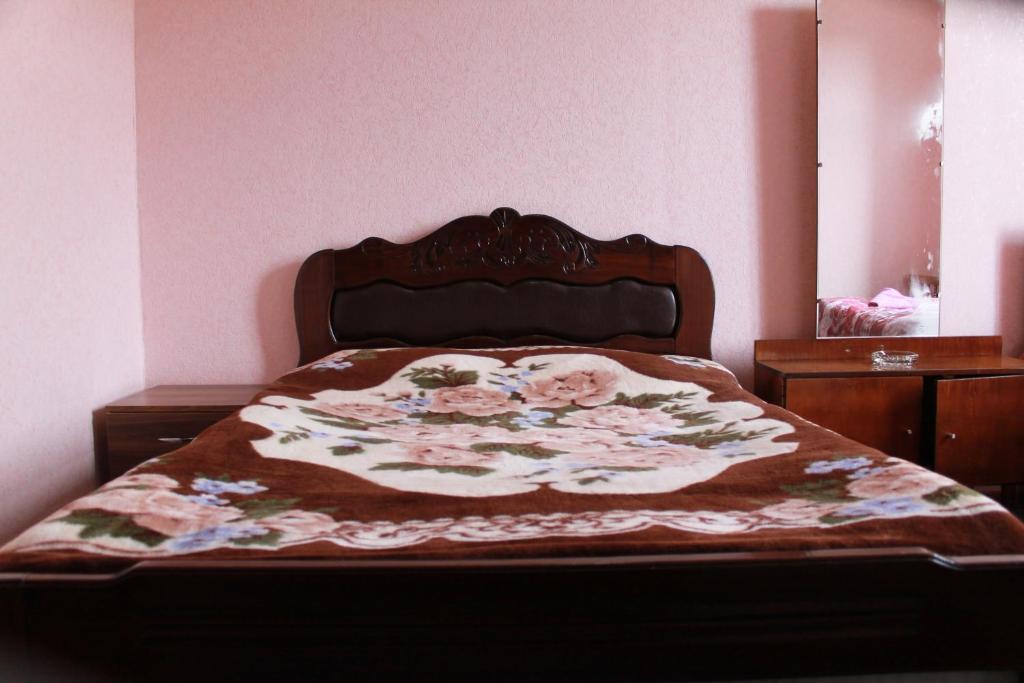 Postel nebo postele na pokoji v ubytování Guest House Shota