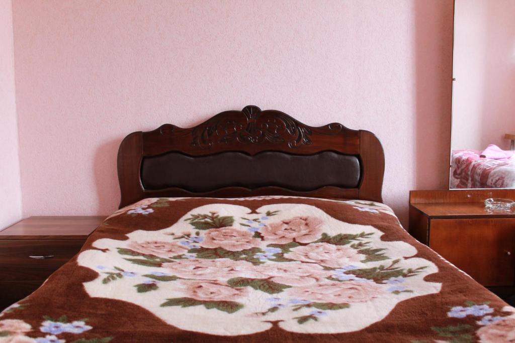 Postel nebo postele na pokoji v ubytování Guest House Shota