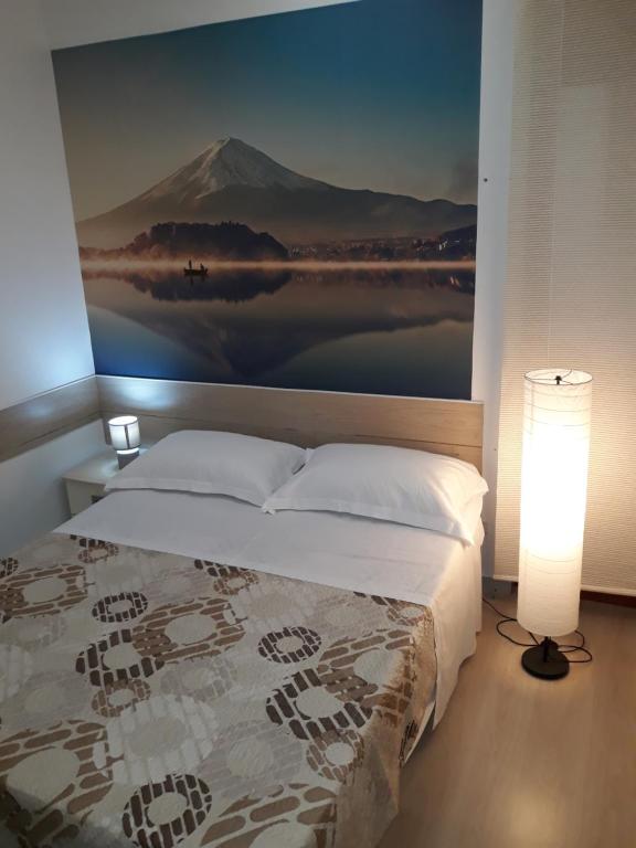 Postel nebo postele na pokoji v ubytování Rooms Center Wolf - Matrimoniale e Comunicanti