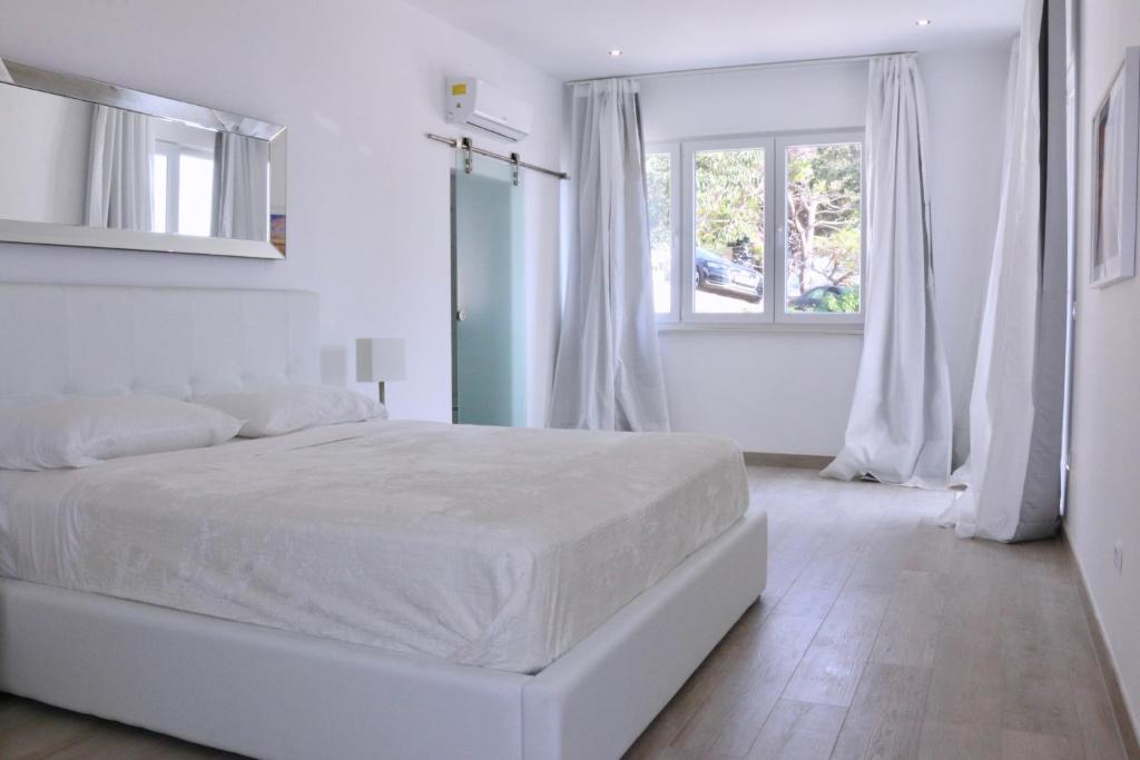 Posteľ alebo postele v izbe v ubytovaní Villa Mel II