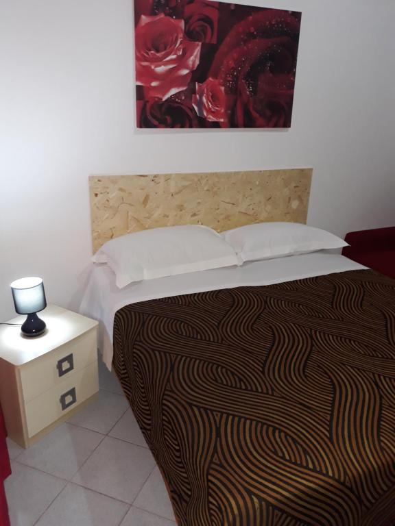 Postel nebo postele na pokoji v ubytování Rooms Center Wolf - Matrimoniale e Comunicanti