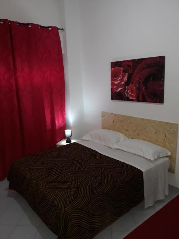 Postel nebo postele na pokoji v ubytování Rooms Center Wolf - Matrimoniale e Comunicanti