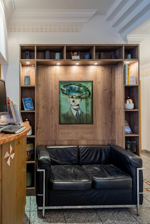 TV a/nebo společenská místnost v ubytování Hotel Neuer am See