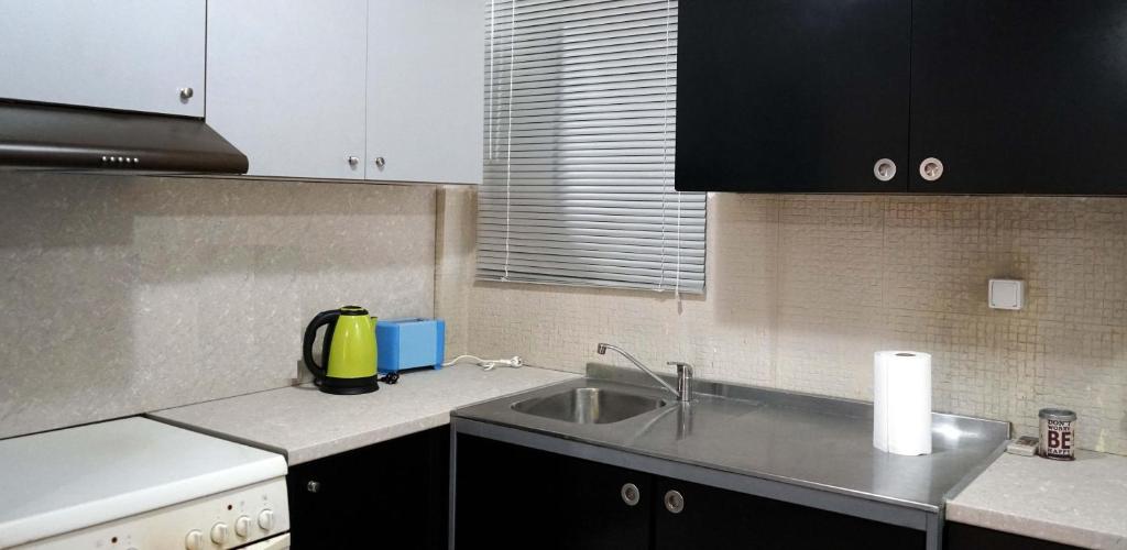 Kuchyňa alebo kuchynka v ubytovaní Dream Acropolis Flat