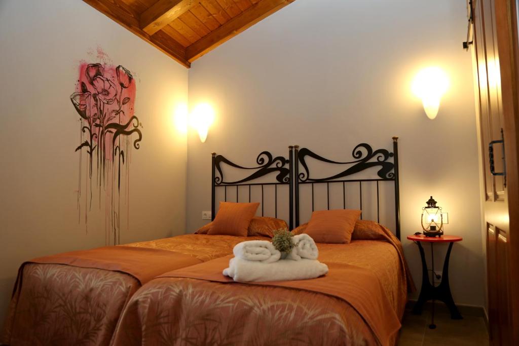 Postel nebo postele na pokoji v ubytování Hostal Rural Villa de Mendavia