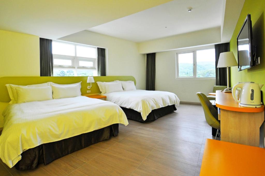 Postel nebo postele na pokoji v ubytování Fullon Poshtel Kenting