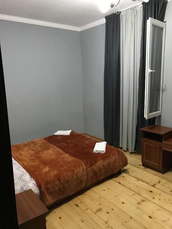Postel nebo postele na pokoji v ubytování Guesthouse am Museum