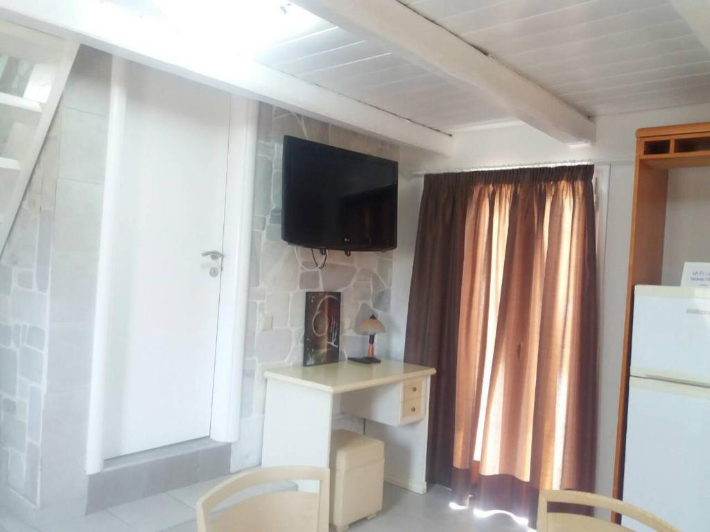 TV a/nebo společenská místnost v ubytování Laskas Apartment