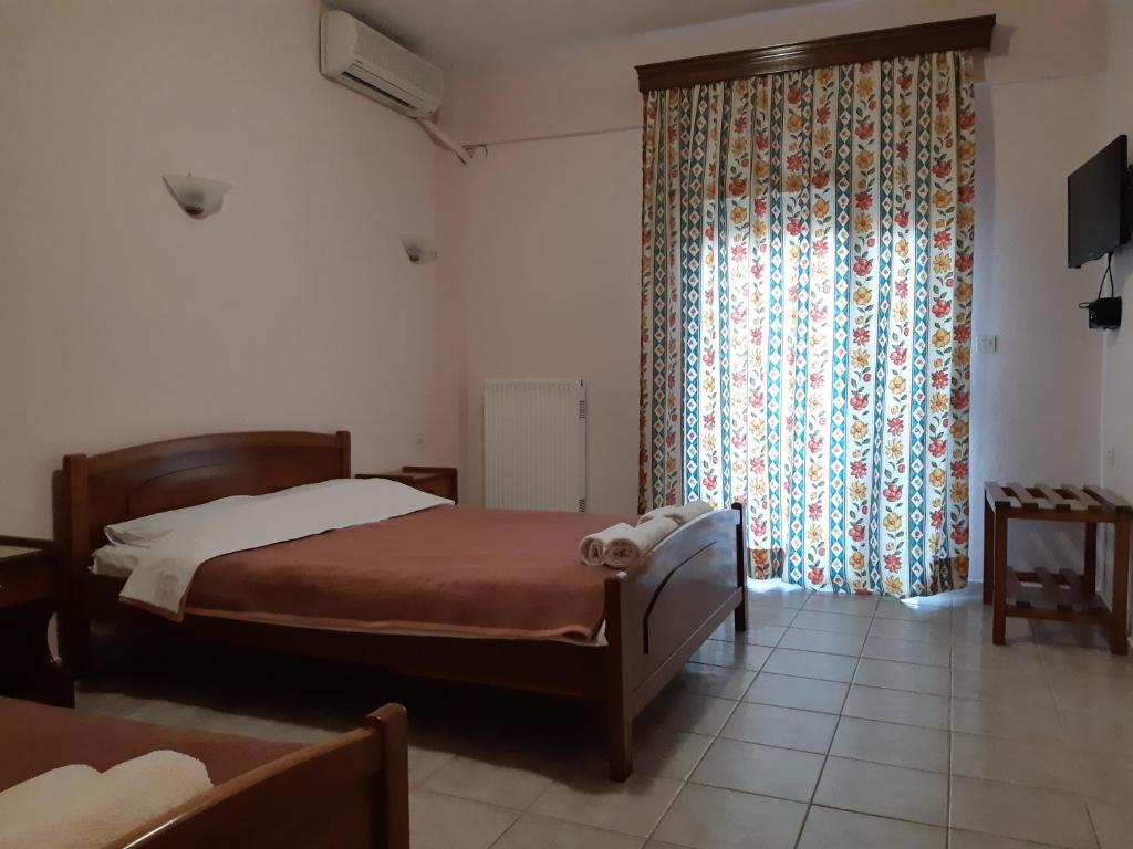 Postel nebo postele na pokoji v ubytování Lidra