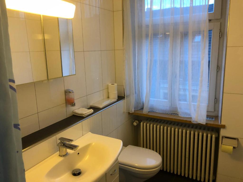 Un baño de SASS APARTHOTEL