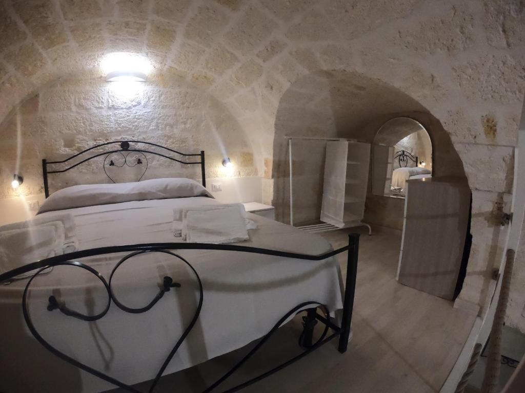 Posteľ alebo postele v izbe v ubytovaní casa principe di napoli