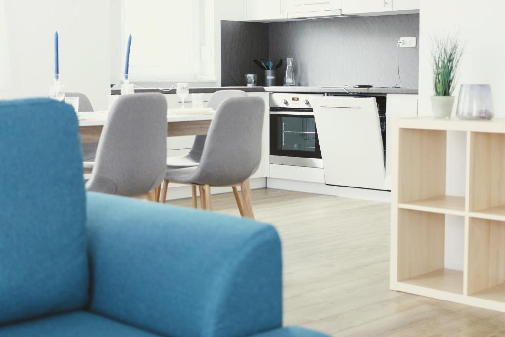 Kuchyňa alebo kuchynka v ubytovaní RESIDENCES by zec – SUPERIOR comfort. PERFECT holidays.
