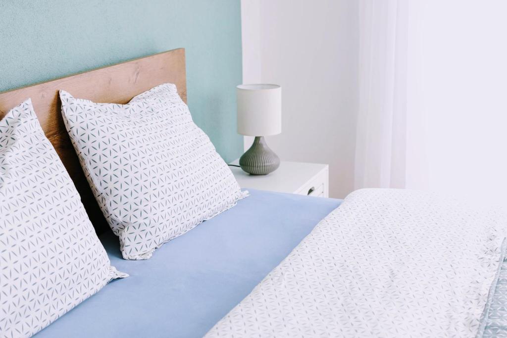 Posteľ alebo postele v izbe v ubytovaní RESIDENCES by zec – SUPERIOR comfort. PERFECT holidays.
