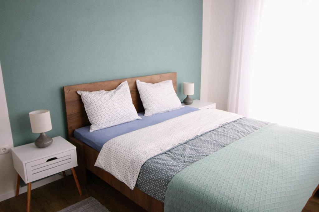 Posteľ alebo postele v izbe v ubytovaní RESIDENCES by zec – SUPERIOR comfort. PERFECT holidays.
