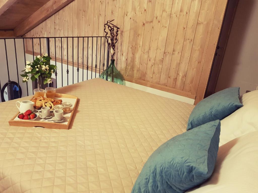 Postel nebo postele na pokoji v ubytování Cascina Ghitin Relais