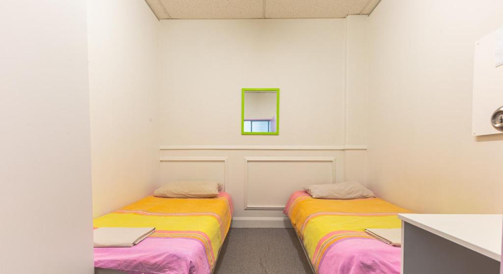 Postel nebo postele na pokoji v ubytování BK Hostel