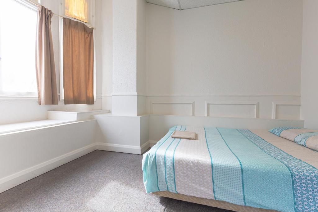 Postel nebo postele na pokoji v ubytování BK Hostel