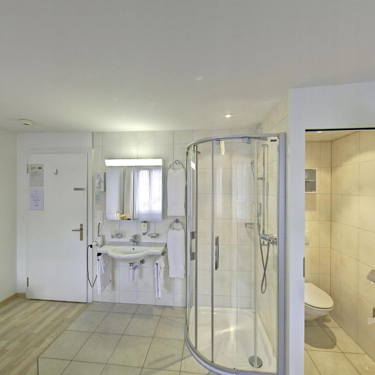 Koupelna v ubytování Hotel Sporting