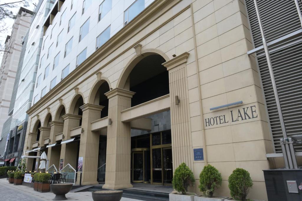 a hotel like building on a city street at Lake Tourist Hotel in Seoul