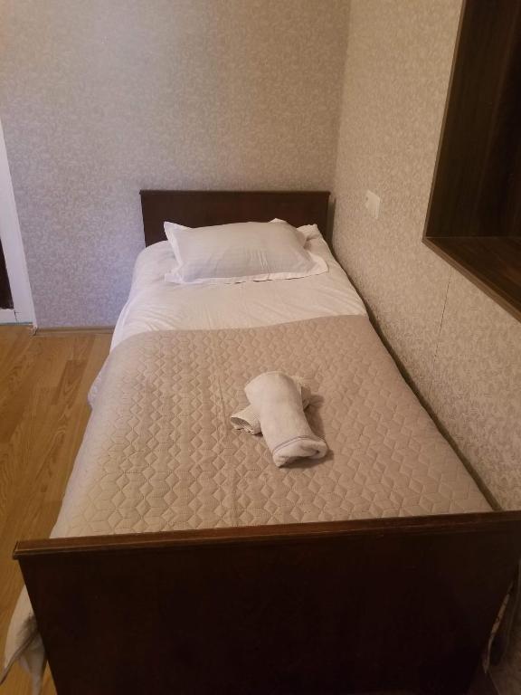 Postel nebo postele na pokoji v ubytování Guest House Shvelidze