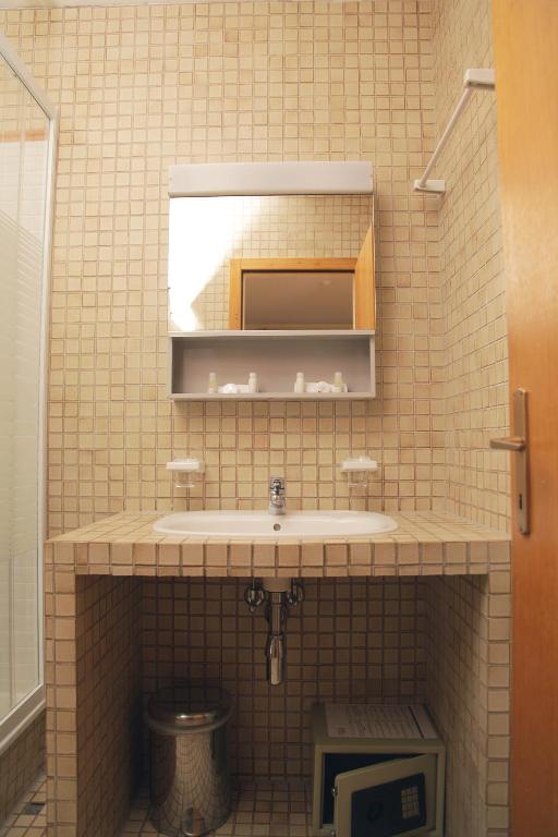 Koupelna v ubytování Appart'Hôtel Residence Dizerens