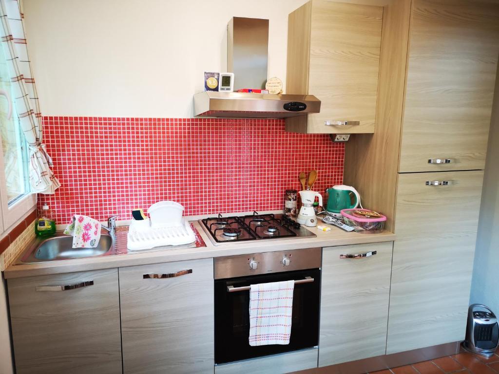 Kuchyň nebo kuchyňský kout v ubytování I Tre Abeti - Holiday House