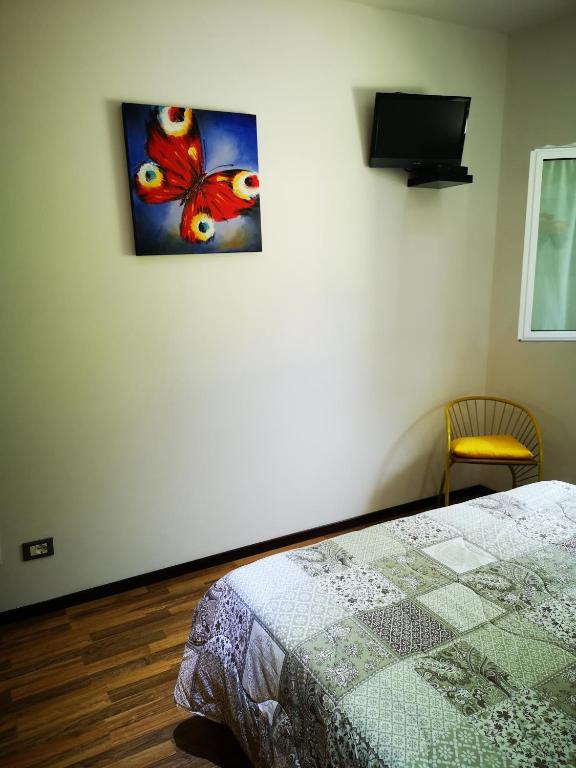 Postel nebo postele na pokoji v ubytování I Tre Abeti - Holiday House