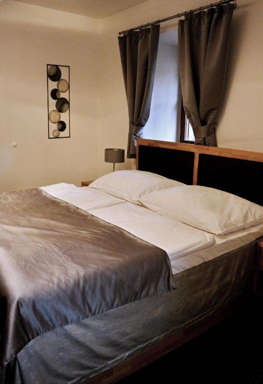 Postel nebo postele na pokoji v ubytování Český Statek