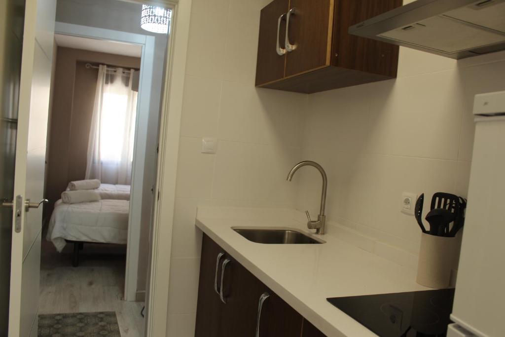 Kuchyň nebo kuchyňský kout v ubytování Apartamento Jardines de Cuenca