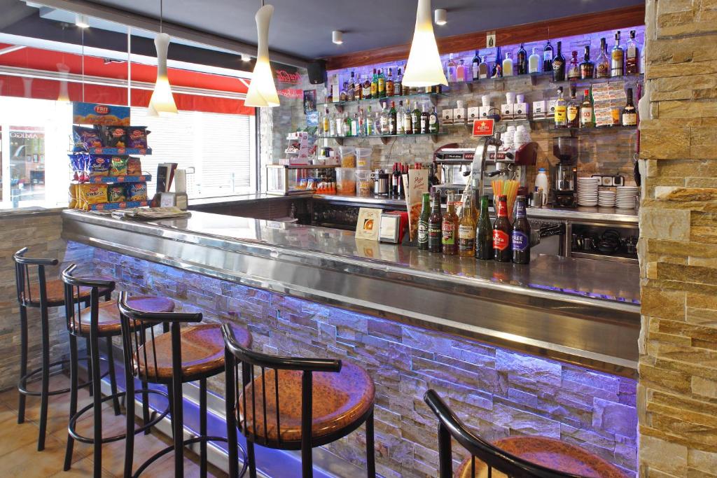 Lounge nebo bar v ubytování Hostal - Pensión El Amigo