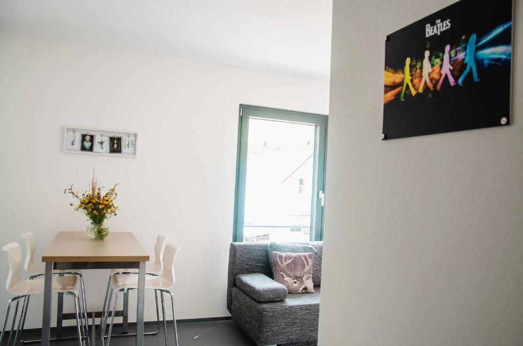 Posezení v ubytování BikeHikeSleep Apartments