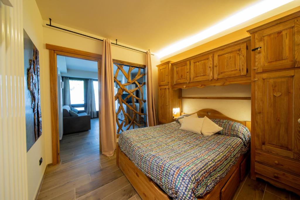 Postel nebo postele na pokoji v ubytování Cervinia – Matterhorn Apartments