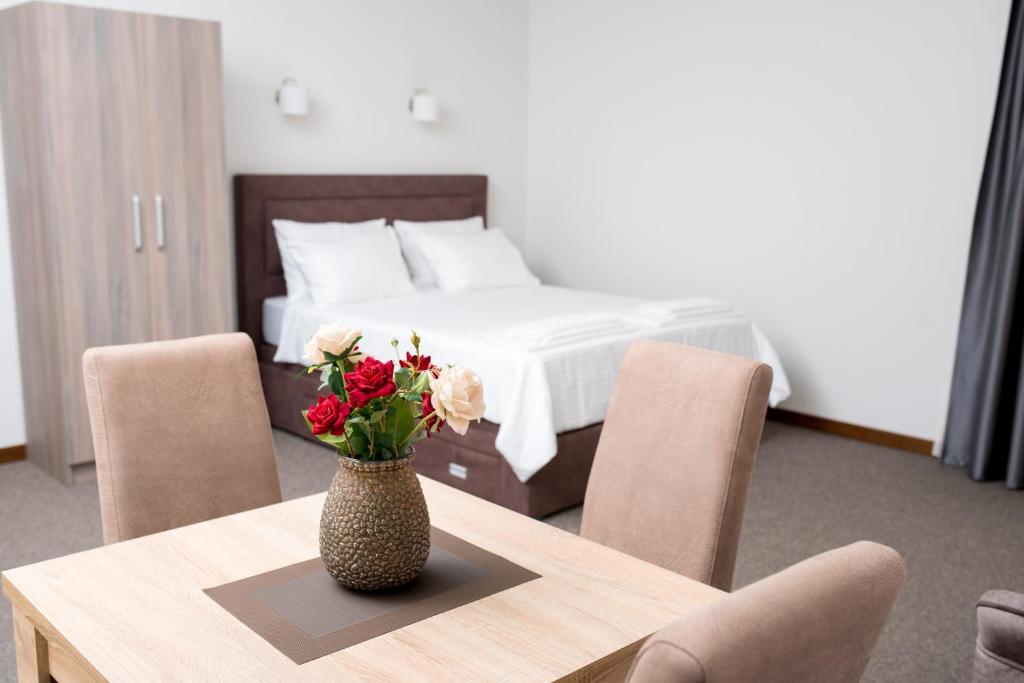 Postel nebo postele na pokoji v ubytování IPN APARTMENTs