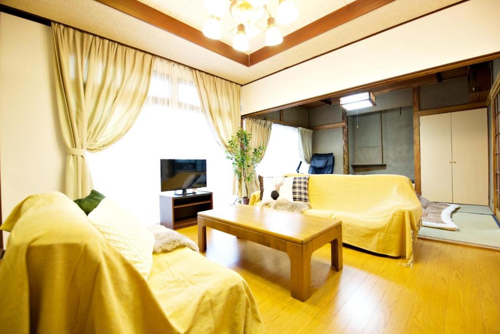 TV a/nebo společenská místnost v ubytování Gunma House