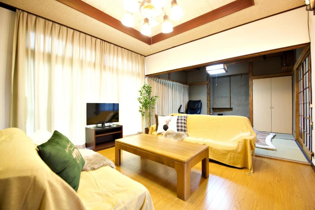 TV a/nebo společenská místnost v ubytování Gunma House