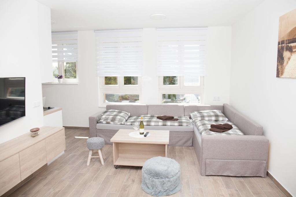 Postel nebo postele na pokoji v ubytování Apartmán Horní Mísečky J4